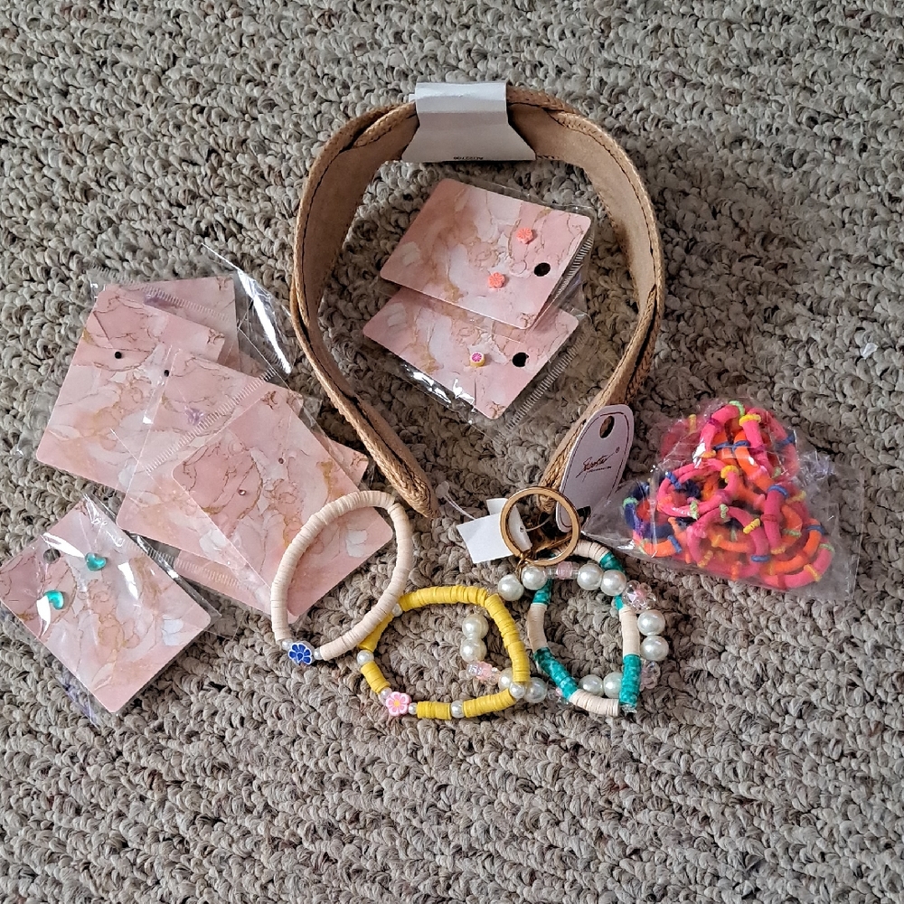 Assorted Accessories Set Earrings, Hair Accessories, and Bracelets.